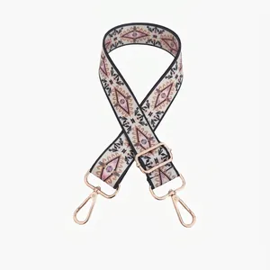 Detailed ethnic geometric pattern fabric strap with adjustable light gold metal buckles