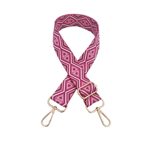 Adjustable geometric diamond pattern bag strap with rose pink weave and gold metal hooks