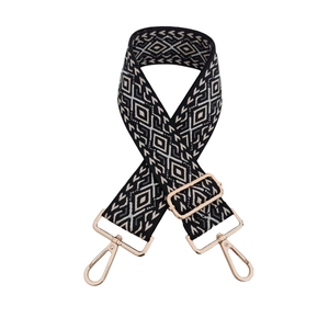 Adjustable wide jacquard bag strap with black and white geometric diamond patterns