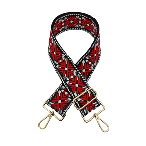 Ethnic style embroidered bag strap with red and black geometric star patterns and gold clips