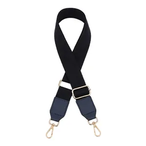 Close-up of black woven adjustable strap with blue leather ends and gold metal hooks