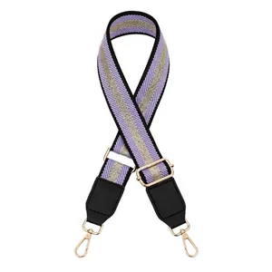 Adjustable woven purse strap with purple and gold stripes and gold swivel hooks