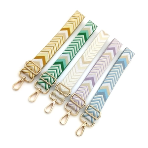 Adjustable chevron patterned woven shoulder straps for crossbody bags with gold hardware