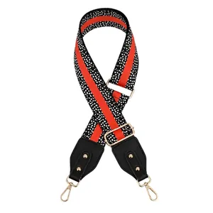 Adjustable red and black patterned replacement strap with gold metal buckle, No. 6