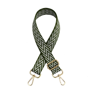 Adjustable green and white wave pattern shoulder strap with gold metal hardware