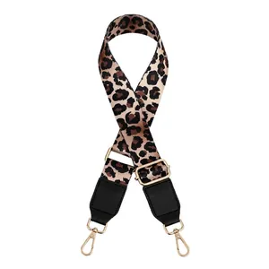 Close-up of leopard print PU leather bag strap with adjustable gold metal buckles