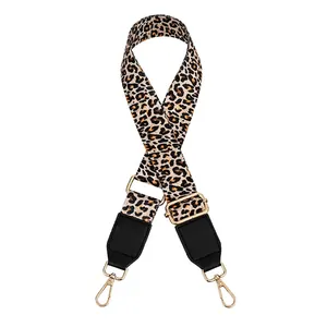 Adjustable leopard print bag strap with golden metal hooks and black leather ends