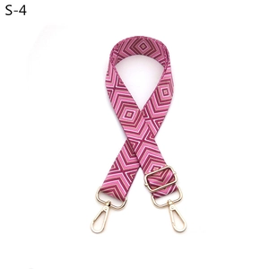 Detail view of adjustable ethnic guitar strap with purple and beige diamond patterns