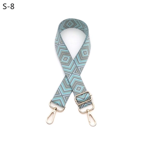 Adjustable guitar-style strap for bags featuring blue and white geometric rhombus pattern