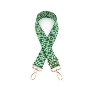 Adjustable green geometric diamond pattern woven guitar strap with gold hardware hooks