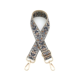 Adjustable guitar-style floral embroidered handbag strap with golden lobster clasps