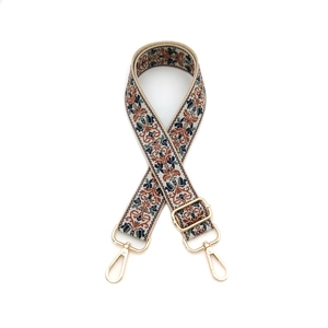 Adjustable guitar-style wide bag strap with morning glory flower patterns and gold buckles