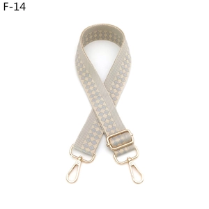 Adjustable wide woven shoulder strap with blue checkerboard pattern and gold hooks