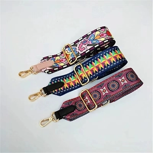 Detail of adjustable PU leather bag straps with bohemian floral and geometric patterns