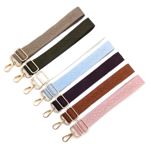 Adjustable nylon shoulder straps with diamond patterns and golden metal lobster clasps