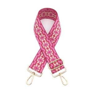 Adjustable jacquard bag strap with pink floral pattern and gold metal hardware
