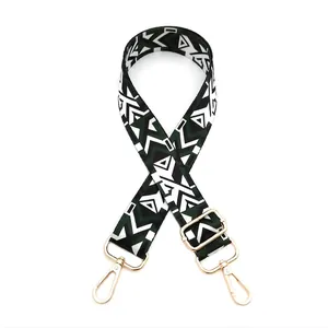 Adjustable wide woven guitar-style shoulder strap with ethnic green geometric patterns