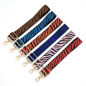 Adjustable crossbody shoulder straps with zebra pattern and gold metal hooks in six colors