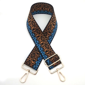 Ethnic style woven canvas bag strap with geometric patterns and golden lobster clasps