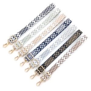 Ethnic geometric pattern crossbody bag straps with golden buckles in various colors