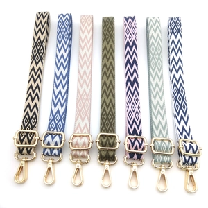 Adjustable 2.5cm woven bag straps with geometric patterns and gold metal buckles