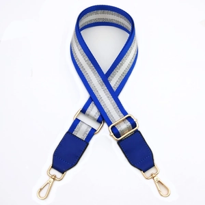 Adjustable blue and silver striped replacement shoulder strap with gold metal hardware