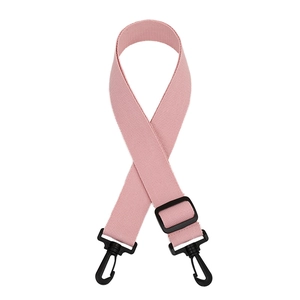 Pink wide woven bag strap with black plastic swivel hooks and adjustable buckle detail