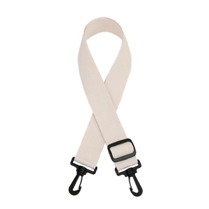 Detail of off-white thick woven bag strap with black plastic hooks and length adjuster