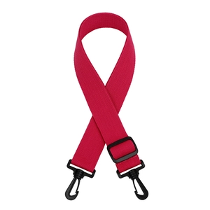Detail of red nylon shoulder strap with adjustable buckle and black plastic swivel hooks