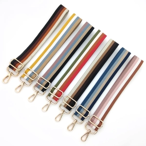 Eight colorful striped canvas bag straps with gold metal hooks and adjustable buckles
