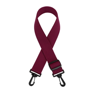 Detail view of burgundy woven adjustable shoulder strap with black plastic swivel snap hooks