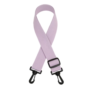 Close-up of lavender canvas bag strap with black plastic swivel hooks and adjustable buckle