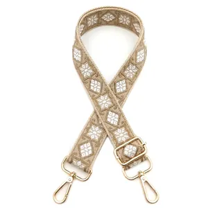 Adjustable khaki jacquard shoulder strap with white diamond pattern and gold hooks