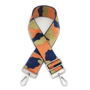 Adjustable wide camouflage bag strap with navy blue, orange and gold metallic thread