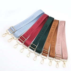Adjustable nylon webbing shoulder strap with fashion lettering and gold metal hardware