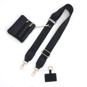 Adjustable crossbody phone strap set with black leather coin purse and gold hardware