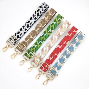 Adjustable woven shoulder straps with geometric patterns and golden metal hardware