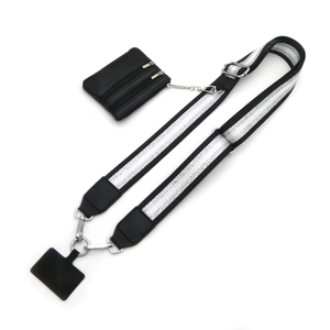 Detail of black woven wide strap with silver stripes and triple-zipper leather pouch