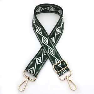 Adjustable dark green wide shoulder strap with white geometric diamond jacquard and gold clips