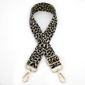 Adjustable leopard print wide bag strap with gold metal hooks and luxury woven texture