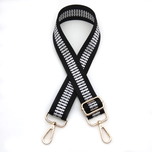 Adjustable black shoulder strap with silver metallic weaving and gold-tone lobster clasps