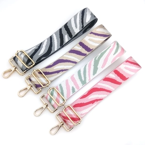 Adjustable zebra stripe bag straps with gold metal hooks in four stylish colors