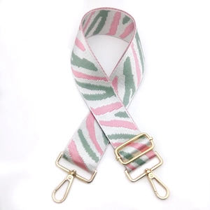 Adjustable wide replacement bag strap with pink zebra pattern and gold metal hardware