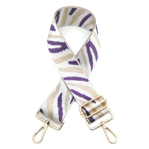 Adjustable wide zebra-pattern woven shoulder strap with gold-tone hardware for handbags