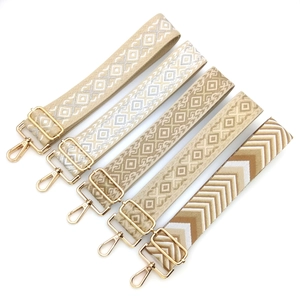 Adjustable wide jacquard bag straps with golden hardware in various geometric patterns