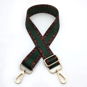 Adjustable leopard print bag strap with green stripe and gold metal lobster clasps