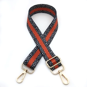 Adjustable leopard print wide shoulder strap with orange stripe and gold metal hooks