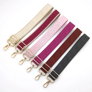 Adjustable woven nylon shoulder straps with FF pattern and gold metal lobster clasps