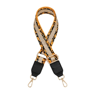 Adjustable wide leopard print bag strap with silver metallic stripe and gold hardware