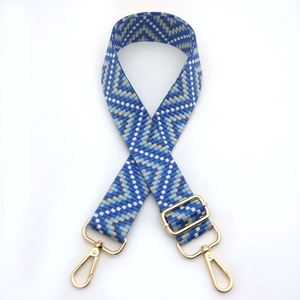 Adjustable woven shoulder strap with blue diamond pattern and golden metal hooks